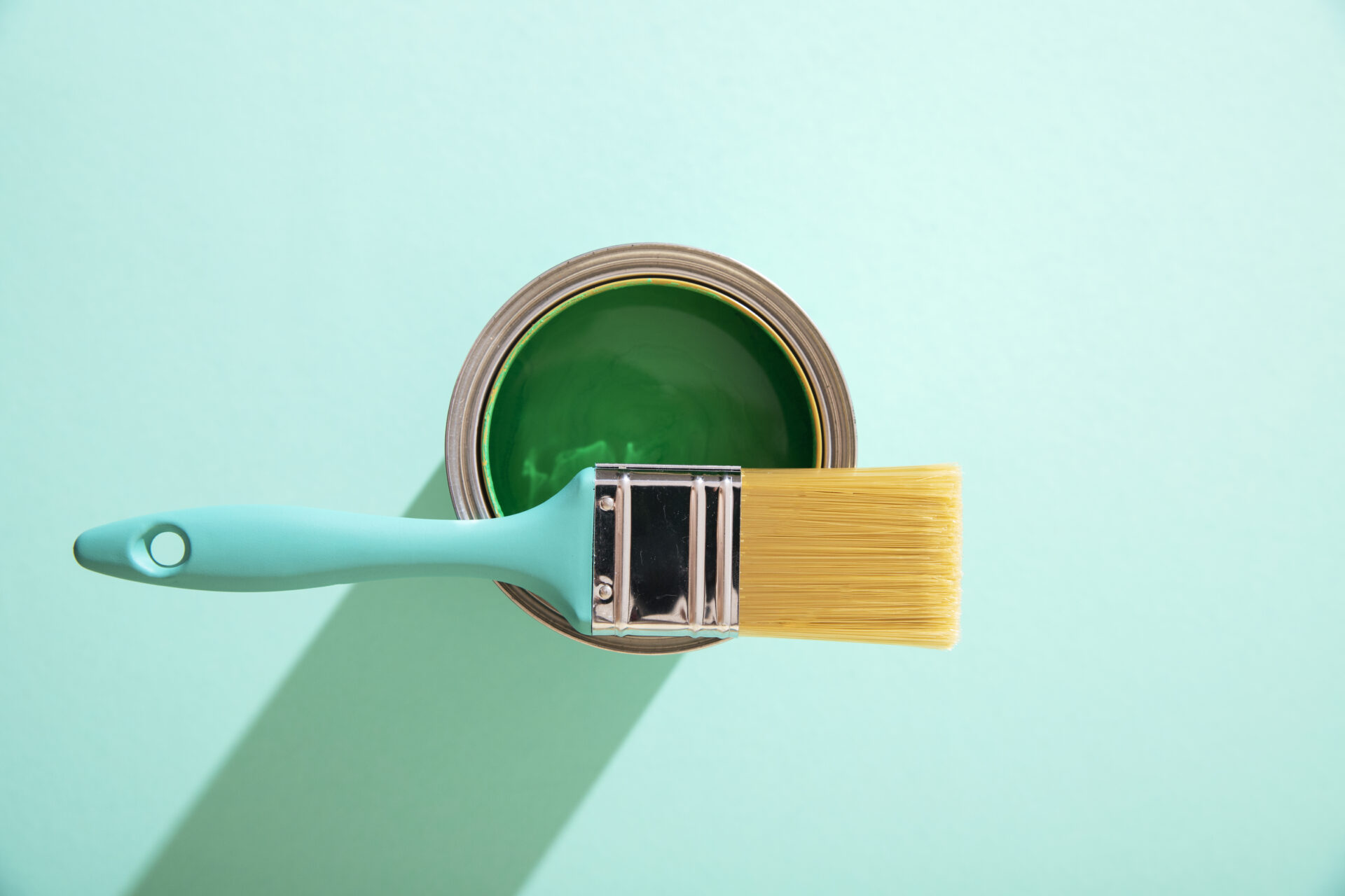 assortment painting items with green paint (1)